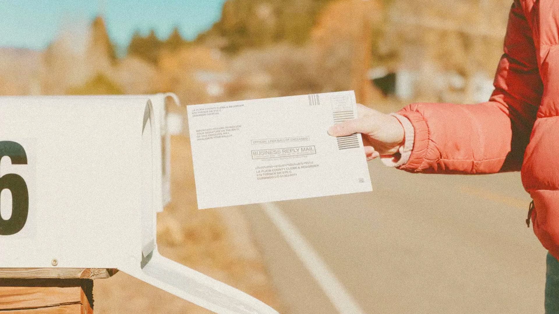 putting a ballot in the mail